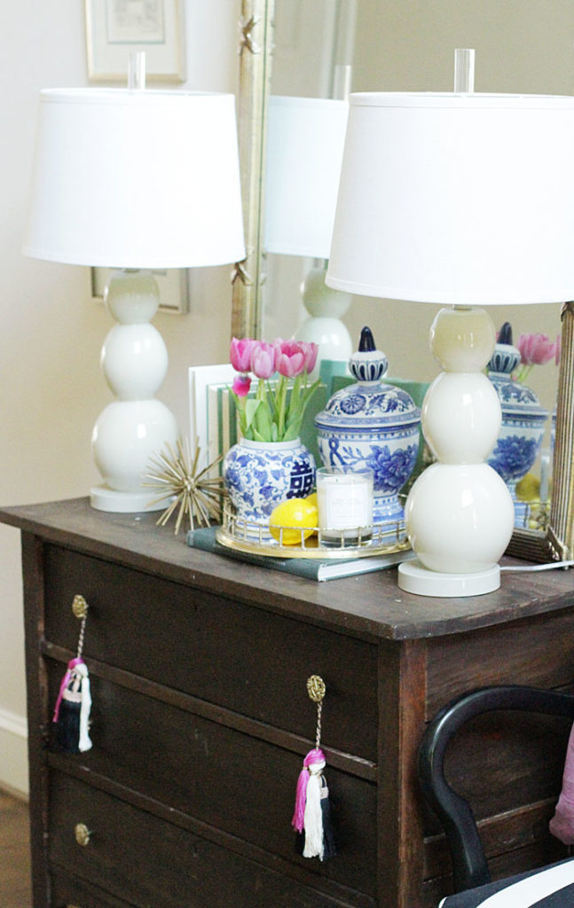 entry way, blue and white ginger jars, brass bamboo tray, white lamps 