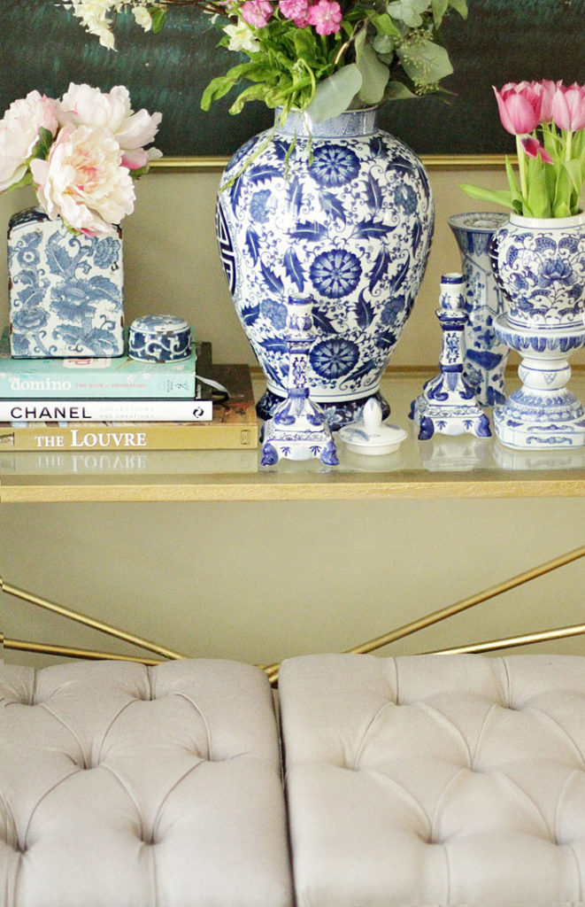 blue and white ginger jars, x-benches, gold coffee table 