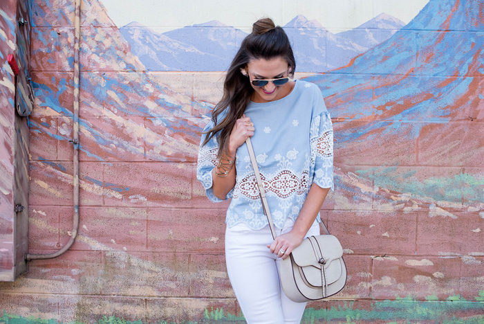 Try pairing this embroidered chambray top with white denim and pink heels for a fun Spring outfit. 