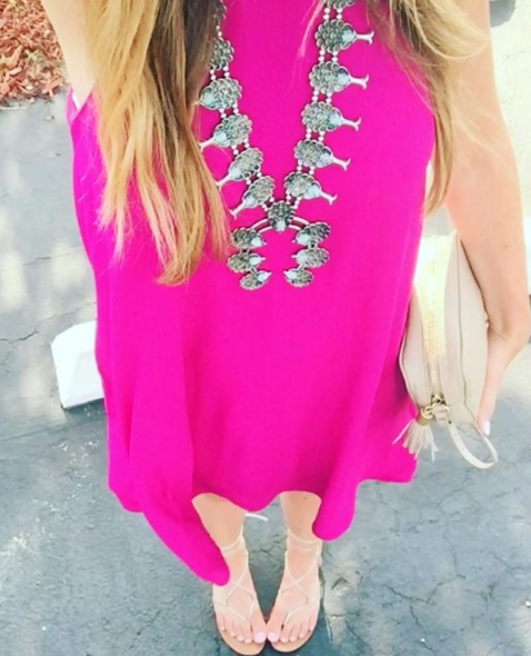 Inexpensive pink tank dress with statement squash blossom necklace