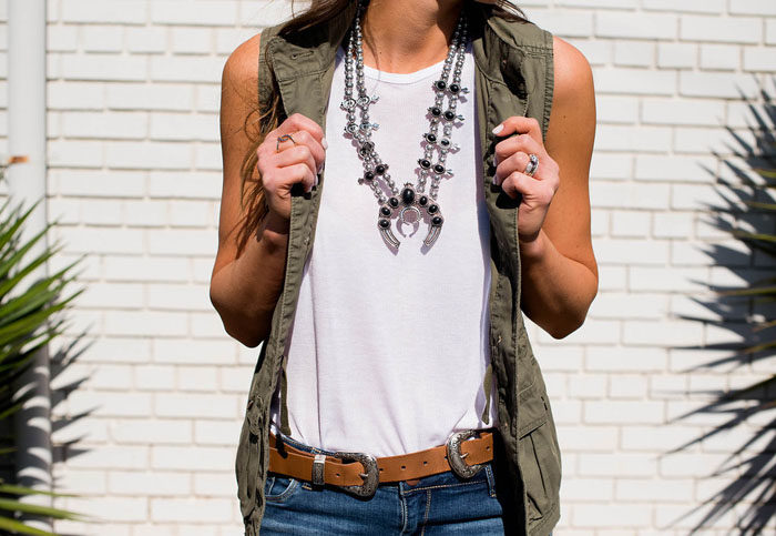 Pair denim shorts with a military vest and add southwestern accessories for a fun Summer look.