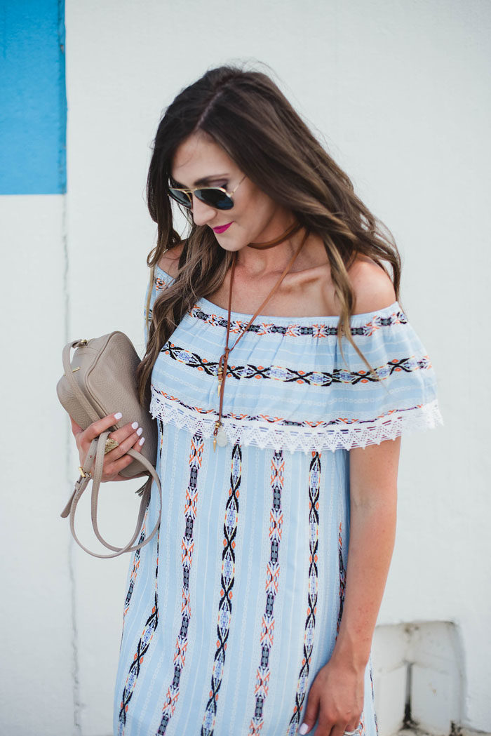 Printed off the shoulder dress with lariat necklace
