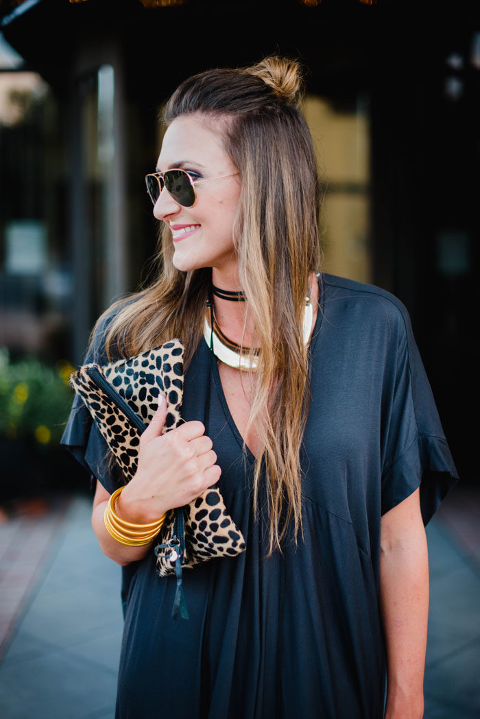 Blogger Mallory Fitzsimmons of Style Your Senses is wearing a chic black shift dress and a trend right black choker for a great Fall transition look.