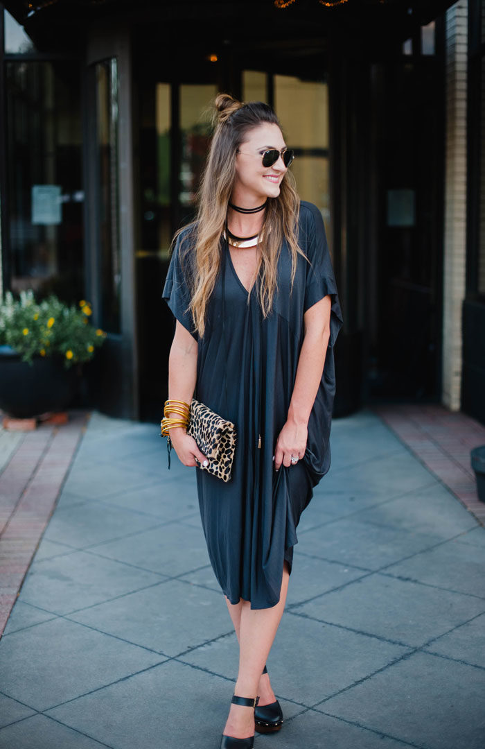 Blogger Mallory Fitzsimmons of Style Your Senses is wearing a chic black shift dress and a trend right black choker for a great Fall transition look.