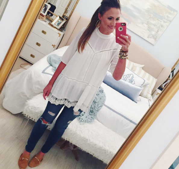 Blogger Mallory Fitzsimmons of Style Your Senses wears a darling lace tunic with boyfriend jeans and mules
