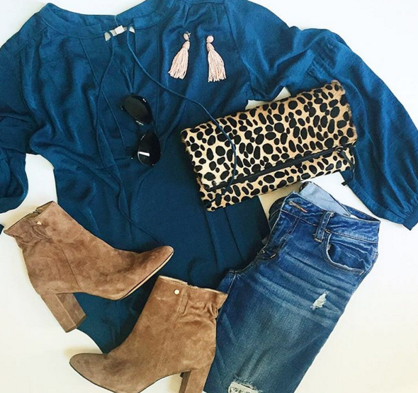 Flatlay outfit with gorgeous teal blue silk top, boyfriend denim, leopard clutch and cute booties