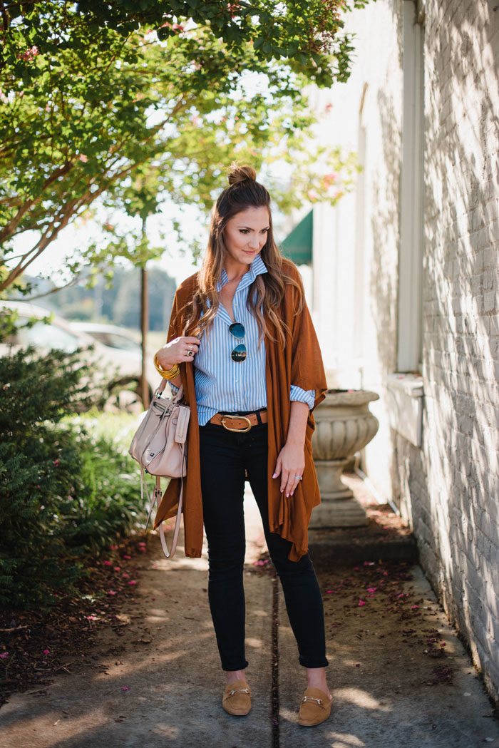 Blogger Mallory Fiztsimmons of Style Your Senses wears a casual striped button up top with black skinny denim and a rust cardigan for a casual Fall look.