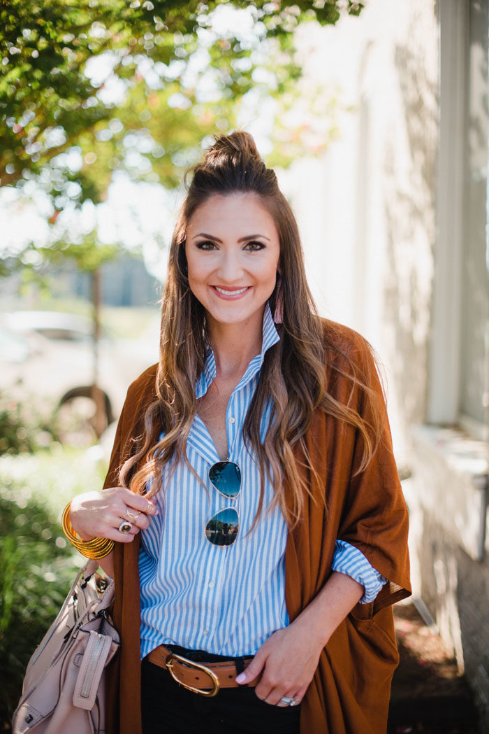 Blogger Mallory Fiztsimmons of Style Your Senses wears a casual striped button up top with black skinny denim and a rust cardigan for a casual Fall look.