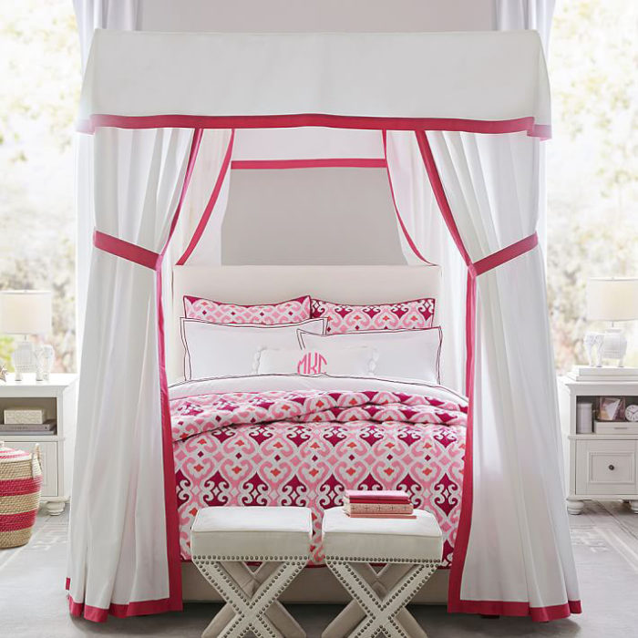 Gorgeous fabric canopy bed in girls room