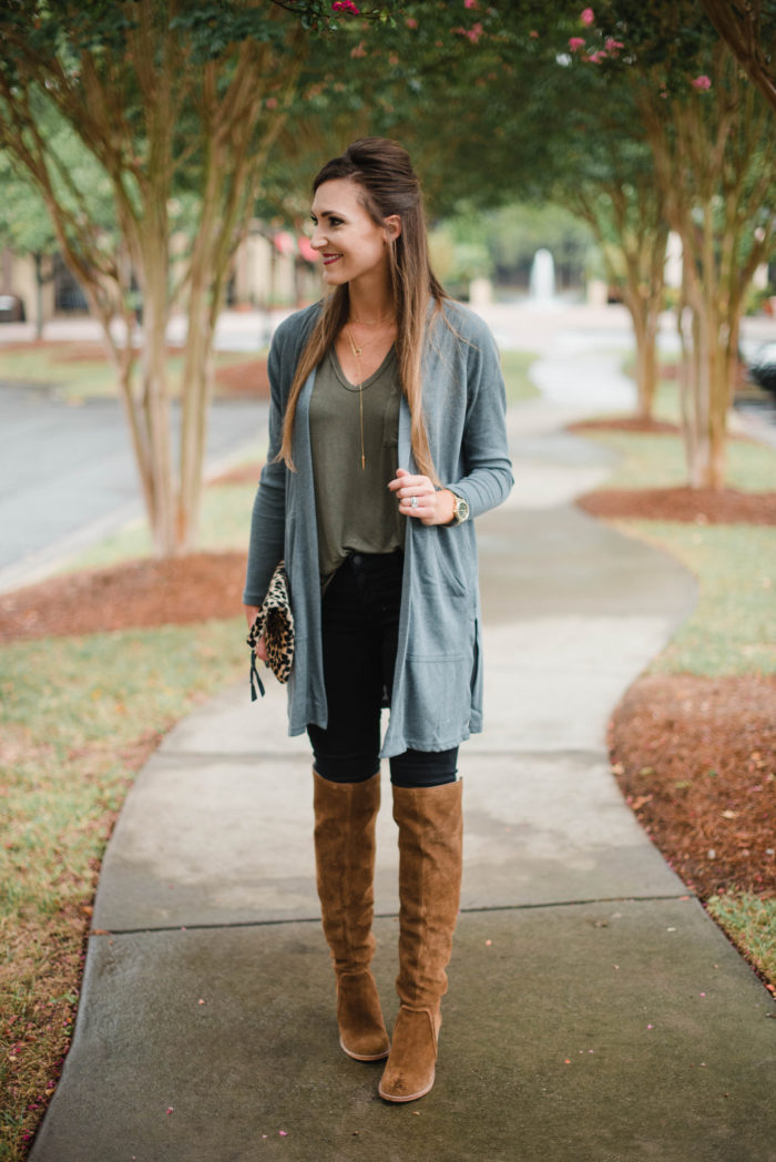 Blogger Mallory Fitzsimmons of Style Your Senses shows how to wear simple layers like a long cardigan and over the knee boots for a casual Fall look.