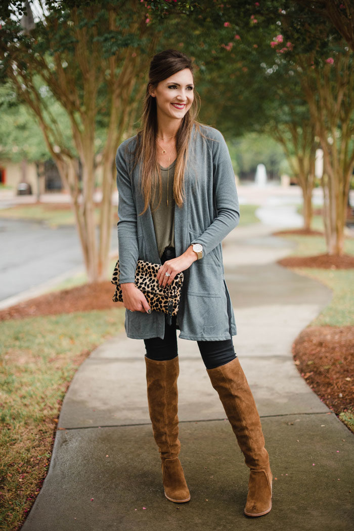 Blogger Mallory Fitzsimmons of Style Your Senses shows how to wear simple layers like a long cardigan and over the knee boots for a casual Fall look.