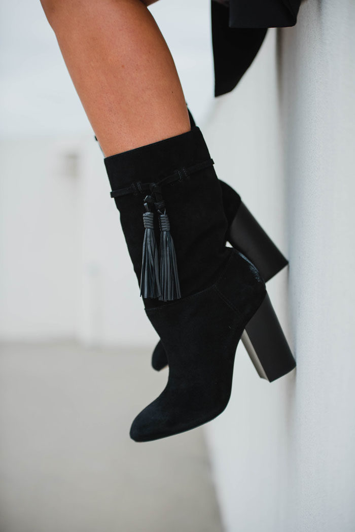 Black Suede Vince Camuto mid calf booties with tassels