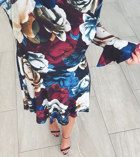 This floral bell sleeve dress is so on trend and great for Fall functions