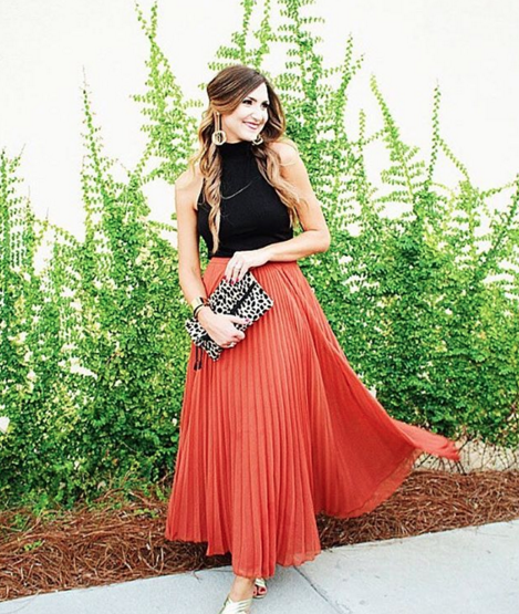 Pair a pleated maxi with a cropped black top for a dressy night
