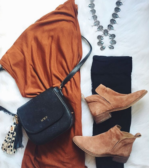 Fashion flat lay with rust cardigan, zella leggings and booties