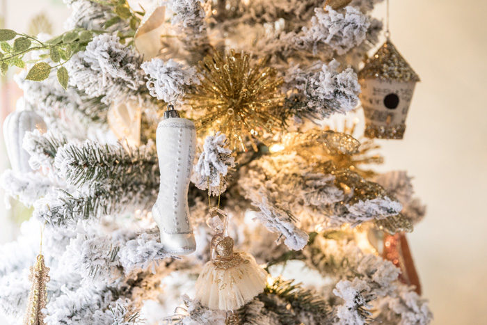 Blogger Mallory Fitzsimmons of Style Your Senses shares her Holiday Home Tour which includes this mini flocked tree in her daughters girly and glam big girl room