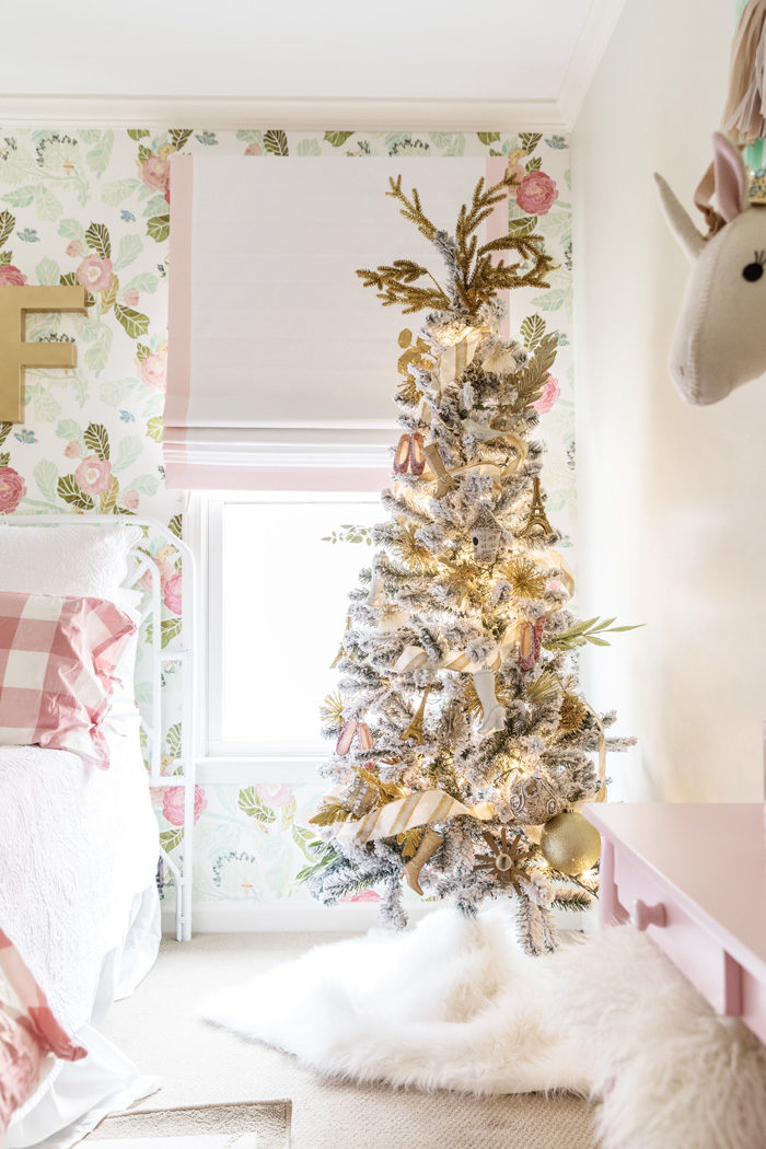 Blogger Mallory Fitzsimmons of Style Your Senses shares her Holiday Home Tour which includes this mini flocked tree in her daughters girly and glam big girl room