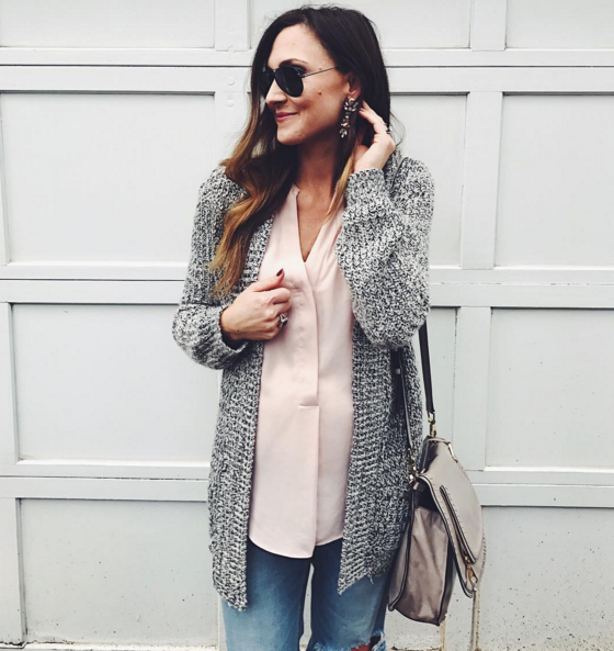 Casual outfit layered with a cozy cardigan, sheer tunic an glam earrings
