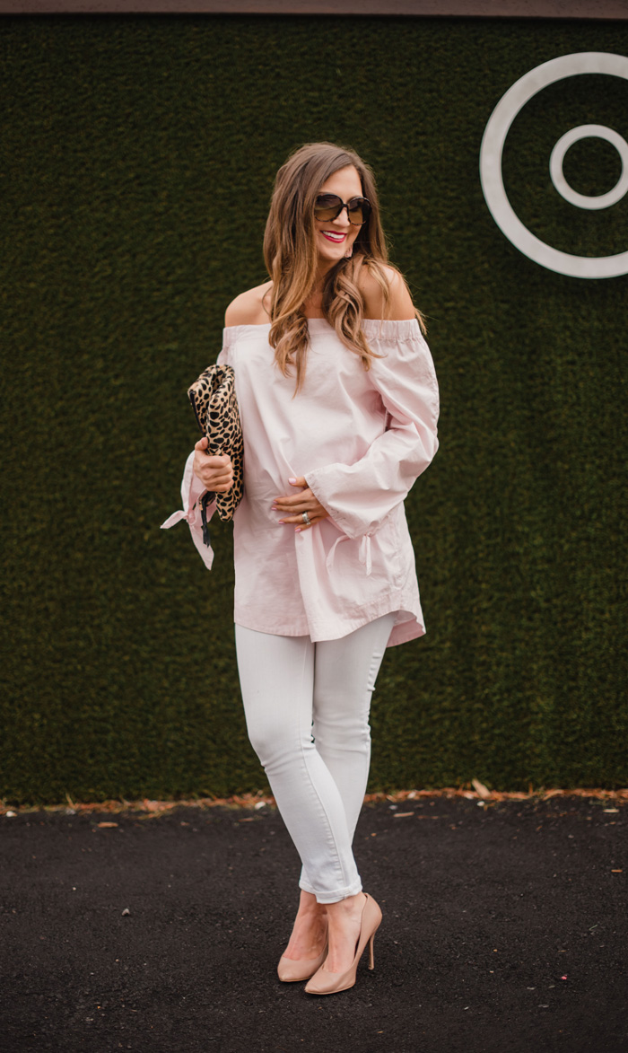 Blush off the shoulder top with white jeans