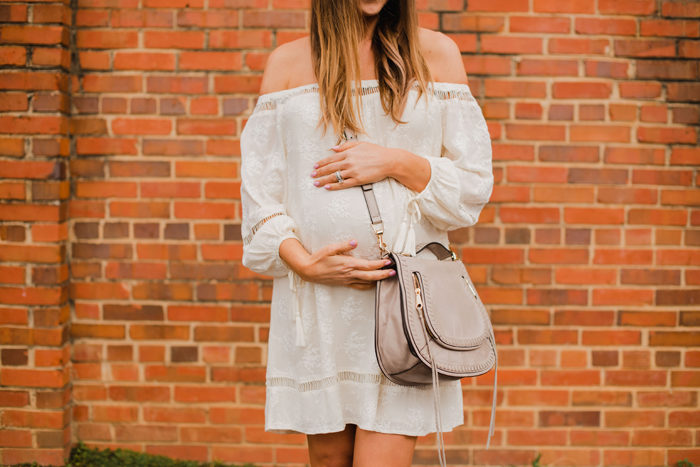 Cream eyelet off the shoulder dress with a fedora hat and gladiatior sandals for Spring