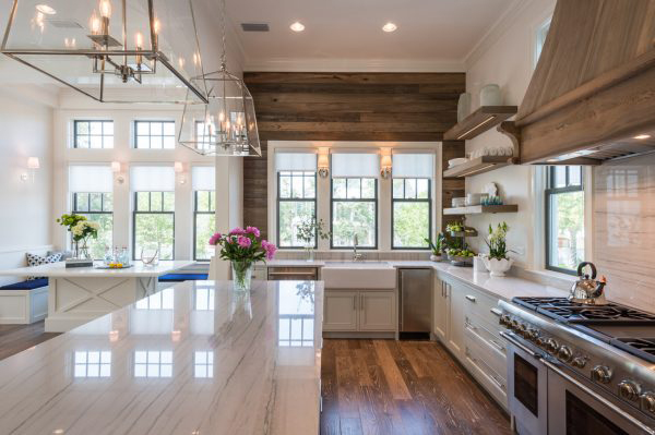 Beautiful kitchen with natural wood shiplap and marble coutnertops