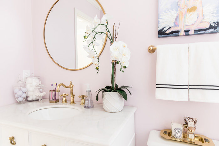 Shared girl's bathroom reveal | Lilac and gold bathroom with black and white tile, original art and applique monogram