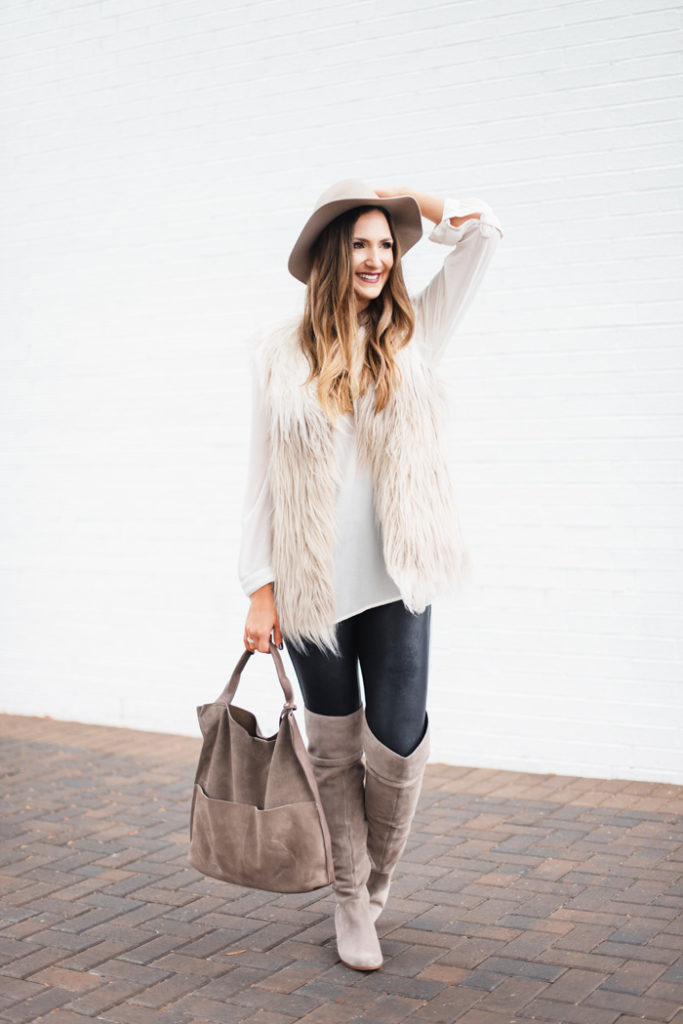 fur vest and over the knee boots 15