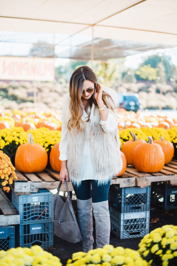 fur vest and over the knee boots 15