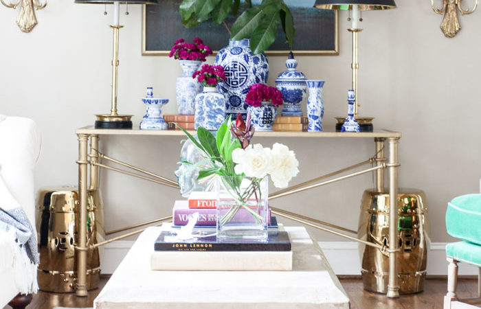 Front Room, Family Room, Modern Chic, Zebra Rug, Tufted Sofa, brass, concrete table