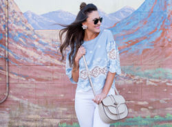 Try pairing this embroidered chambray top with white denim and pink heels for a fun Spring outfit.