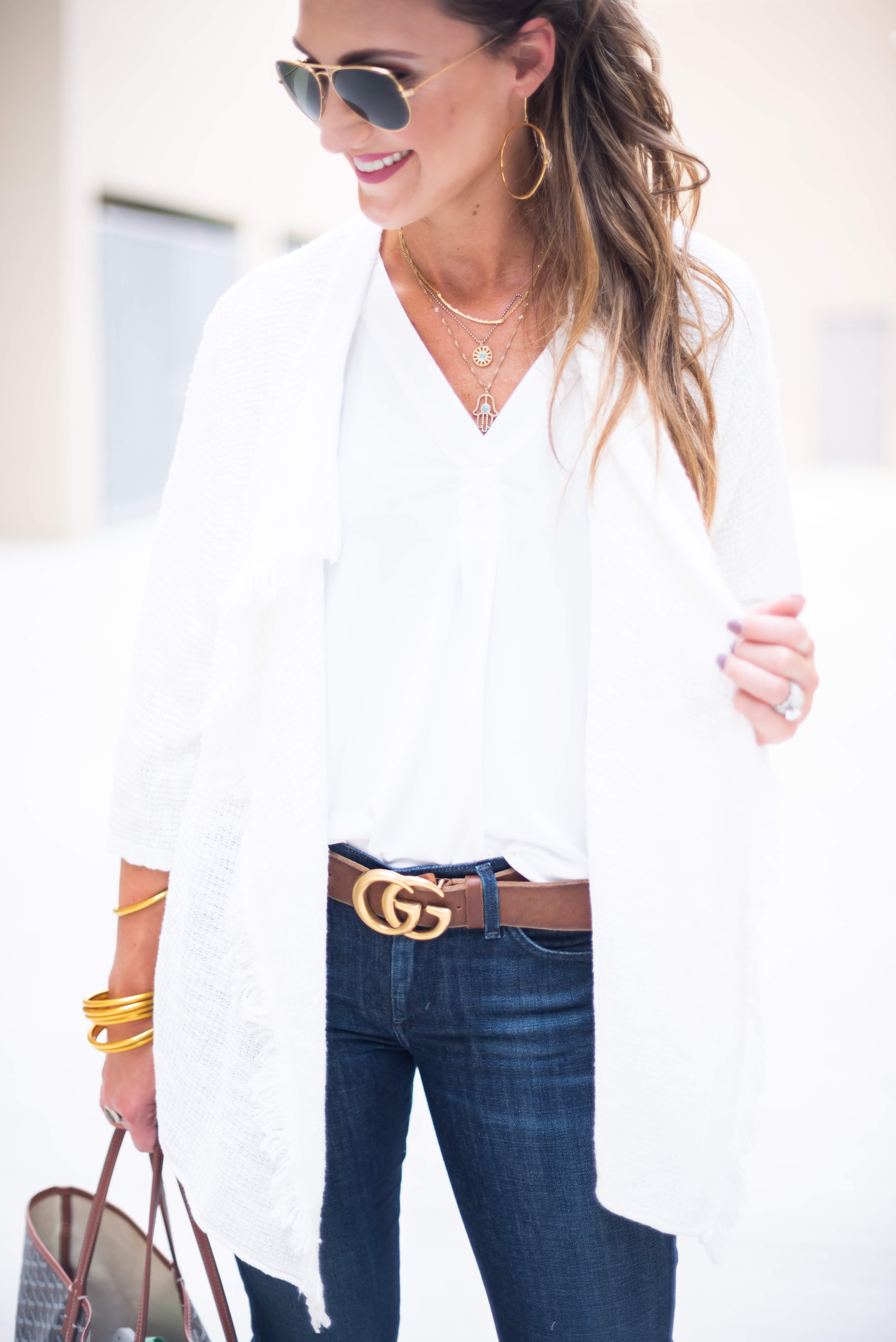 How to Style Denim Flare Jeans featured by popular Dallas fashion blogger Style Your Senses