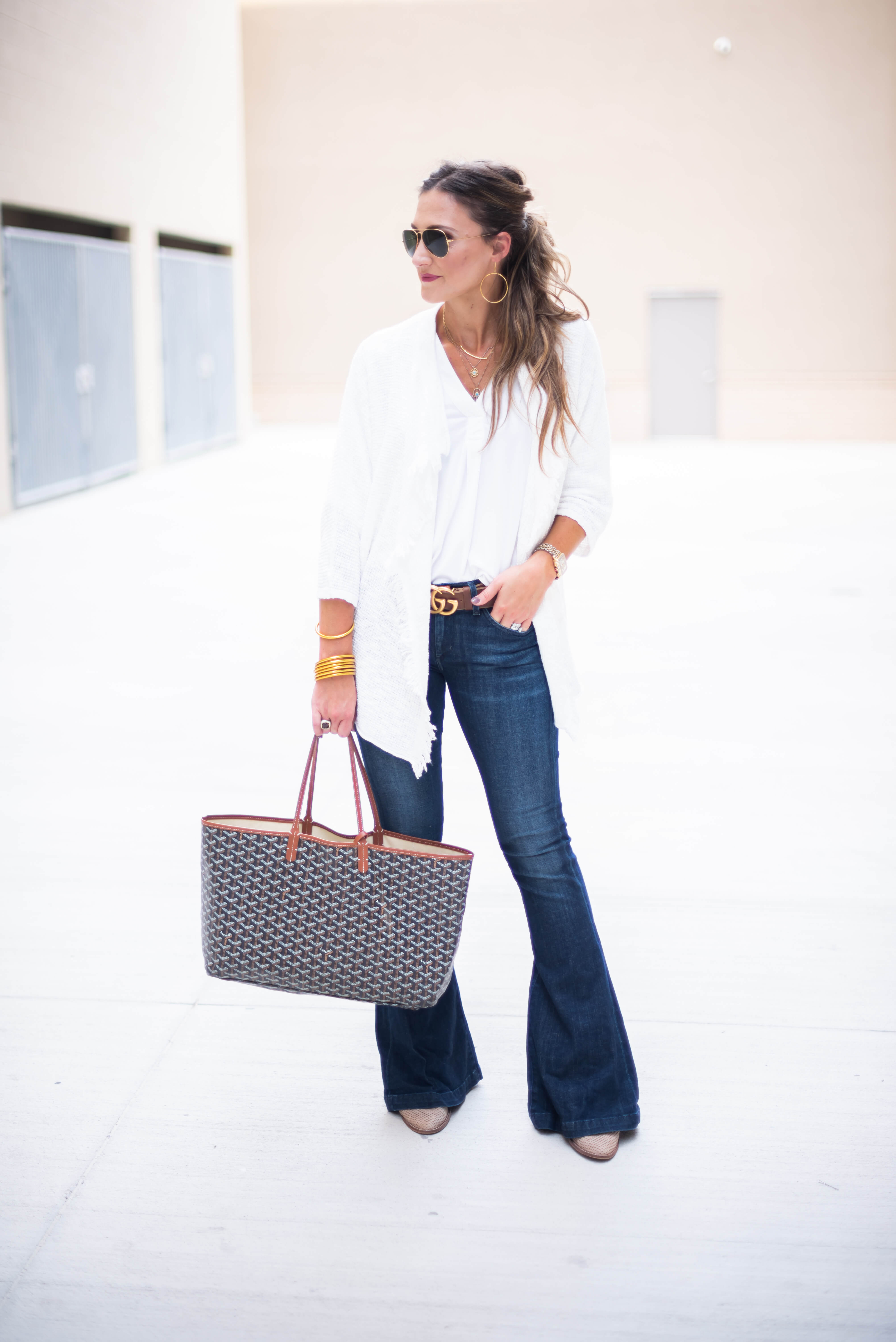 How to Style Denim Flare Jeans featured by popular Dallas fashion blogger Style Your Senses