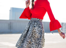holiday party skirt, holiday outfit inspiration, leopard party skirt, red blouse with bell sleeves, style your senses