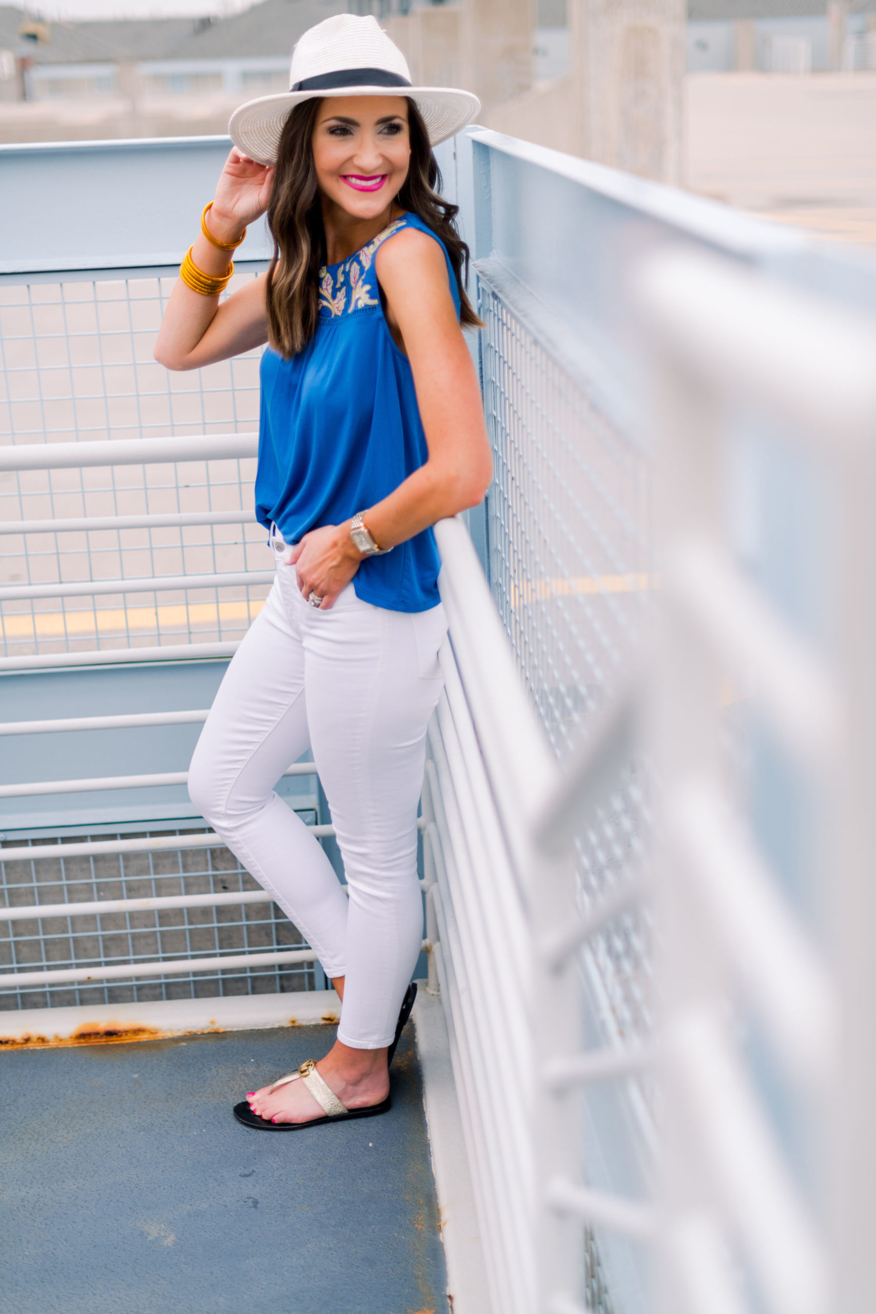 emboridered royal blue top, white skinny jeans, panama hat, resort wear, spring outfit, mallory fitzsimmons, style your senses